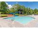 Fun water slide at the community pool, surrounded by lush landscaping and a lifeguard stand at 407 After Glow Smt, Canton, GA 30114