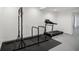 Basement workout area with exercise equipment at 11760 Stratham Dr, Alpharetta, GA 30009