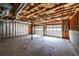 Unfinished basement with exposed ceiling and concrete floor at 2192 Stenger Rd, Douglasville, GA 30135