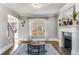 Inviting living room with a fireplace, hardwood floors, and a cozy, welcoming atmosphere at 2217 Virginia Ne Pl, Atlanta, GA 30305