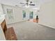 Living room boasts a fireplace and flows into the kitchen with sliding doors to a patio at 380 Birchmere Sw, Atlanta, GA 30331