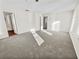 Spacious primary bedroom featuring soft gray carpet, ample natural light, and access to a bathroom at 380 Birchmere Sw, Atlanta, GA 30331