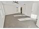 Bright primary bedroom with neutral decor, multiple windows, and an ensuite bathroom at 380 Birchmere Sw, Atlanta, GA 30331