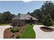 Aerial view of the home with landscaping and a circular driveway at 4079 Bullock Bridge Rd, Loganville, GA 30052