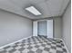 Spacious bonus room with checkerboard floor and closet for storage at 4270 Fallbrook Dr, Duluth, GA 30096