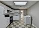 Basement kitchenette, complete with appliances, washer, and dryer at 4270 Fallbrook Dr, Duluth, GA 30096