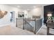 Open hallway with neutral colors and natural lighting, leading to cozy interior at 5955 Misty Hill Ln, Buford, GA 30518