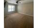 Bright bedroom with carpeted flooring and natural light at 124 Streamside Dr # 24, Roswell, GA 30076