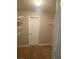 Walk-in closet with carpeted flooring and wire shelving at 124 Streamside Dr # 24, Roswell, GA 30076