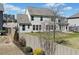 View of fenced backyard of home featuring a well-maintained lawn and partial privacy at 2207 Derbyshire Sw Dr, Marietta, GA 30064