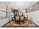 Formal dining room with natural light, decorative chandelier, and hardwood floors at 2207 Derbyshire Sw Dr, Marietta, GA 30064