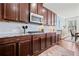 Gourmet kitchen featuring stainless steel appliances, granite countertops, and ample cabinet space at 2207 Derbyshire Sw Dr, Marietta, GA 30064