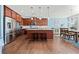 A kitchen and eat-in dining area featuring an island, stainless appliances, and hardwood floors at 2207 Derbyshire Sw Dr, Marietta, GA 30064