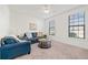 Cozy sitting room with large windows and neutral-toned decor at 2207 Derbyshire Sw Dr, Marietta, GA 30064