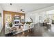 Spacious living room featuring a decorative fireplace, modern furniture and dark hardwood floors at 2395 Saint James Nw Dr, Atlanta, GA 30318