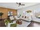 Bright living room with dark floors, modern furniture, and decor at 2395 Saint James Nw Dr, Atlanta, GA 30318