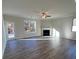 Spacious living room with a fireplace and plenty of natural light at 3687 Lockaby Way, Lawrenceville, GA 30044