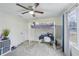 Bedroom featuring a loft bed and desk at 381 Gates Mil Dr, Lawrenceville, GA 30045