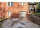 Exterior backyard basement entry in a brick house at 2122 Kimberly Sw Rd, Atlanta, GA 30331