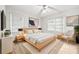 Bright bedroom featuring neutral walls, hardwood floors, and modern furniture at 2122 Kimberly Sw Rd, Atlanta, GA 30331