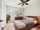 Bedroom featuring hardwood floors, neutral walls, and wooden furniture at 2122 Kimberly Sw Rd, Atlanta, GA 30331