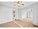 Spacious room with hardwood floors, ceiling fan, and neutral paint at 2122 Kimberly Sw Rd, Atlanta, GA 30331