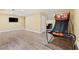 Basement rec room featuring a basketball arcade game and TV at 3710 Glen Ian Dr, Loganville, GA 30052
