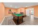 Basement game room featuring a pool table and seating at 3710 Glen Ian Dr, Loganville, GA 30052