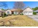 Charming single-story home with a well-maintained front yard and a two-car garage in a suburban neighborhood at 3710 Glen Ian Dr, Loganville, GA 30052