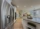 Spacious kitchen with stainless appliances and views of living and dining areas at 1320 Kildare Ct, Snellville, GA 30078