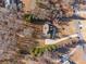 Birds eye view of a home on a large lot showcasing a private backyard and patio at 2148 Ne Indian Shoals Dr, Loganville, GA 30052