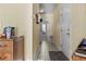 Hallway featuring tile floors and neutral paint at 2148 Ne Indian Shoals Dr, Loganville, GA 30052
