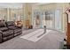 Bright living room with cozy furniture, natural light, and an inviting atmosphere at 2148 Ne Indian Shoals Dr, Loganville, GA 30052