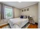 Comfortable bedroom featuring natural light, neutral decor, and a peaceful ambiance for rest and rejuvenation at 2350 Brenda Se Dr, Smyrna, GA 30080