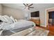 Sunlit bedroom features a ceiling fan, natural light, and a relaxing space for rest and rejuvenation at 2350 Brenda Se Dr, Smyrna, GA 30080