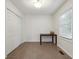 Bright bonus room with tile floor, closet space, and a large window at 2350 Brenda Se Dr, Smyrna, GA 30080