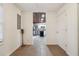 Hallway leading to kitchen with tile floor, and convenient access to the kitchen at 2350 Brenda Se Dr, Smyrna, GA 30080