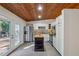 Modern kitchen featuring white cabinets, stainless steel appliances, and an island with a butcher block countertop at 2350 Brenda Se Dr, Smyrna, GA 30080