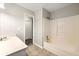 Clean bathroom with a vanity, tub and shower combination, and tiled flooring at 5215 Willow Creek Overlook, Woodstock, GA 30188