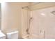 A clean bathroom featuring a tub/shower combination and neutral paint at 653 Inland Way, Lilburn, GA 30047