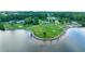 The aerial view of lake and park featuring walking trails, greenery, and recreational facilities, ideal for outdoor activities at 1119 Simonton Glen Way, Lawrenceville, GA 30045