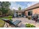 Well-maintained backyard with patio and sunroom at 1119 Simonton Glen Way, Lawrenceville, GA 30045