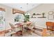 Cozy dining area with hardwood floors, natural light, and charming details at 1119 Simonton Glen Way, Lawrenceville, GA 30045