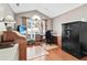 Bright home office with a large window, wooden desk, and hardwood floors at 1119 Simonton Glen Way, Lawrenceville, GA 30045
