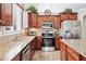 Modern kitchen with stainless steel appliances, granite countertops, and convenient island at 1119 Simonton Glen Way, Lawrenceville, GA 30045