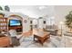 Bright and airy living room featuring vaulted ceilings, hardwood floors, and a cozy seating area at 1119 Simonton Glen Way, Lawrenceville, GA 30045