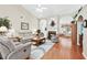 Spacious living room with fireplace, vaulted ceiling, and hardwood floors, perfect for entertaining at 1119 Simonton Glen Way, Lawrenceville, GA 30045