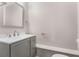Bathroom features a modern vanity with grey cabinets and a white countertop at 2831 Spruce Point Rd, South Fulton, GA 30349