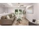 Cozy living room with large windows and stylish furnishings, creating a welcoming atmosphere at 2831 Spruce Point Rd, South Fulton, GA 30349