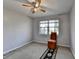 Bedroom has standard ceiling fan, plush carpet, and good natural light at 1037 Martin Rd, Stone Mountain, GA 30088